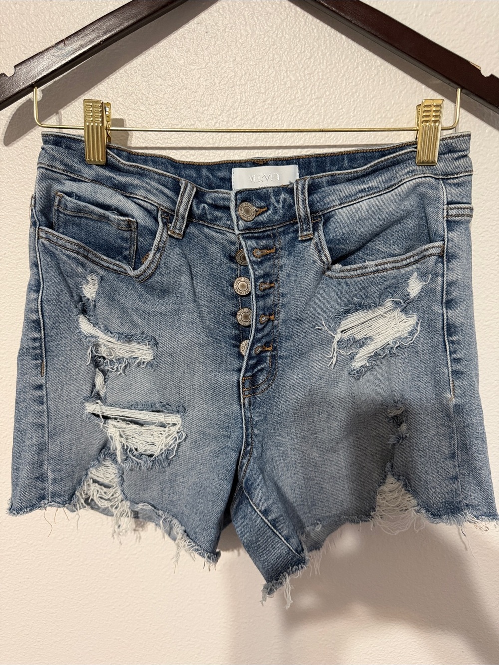 High-Rise Distressed Light Blue Jean Shorts with Button Fly